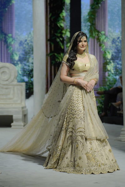 TOOSH DUPION EMBROIDERED TREE OF LIFE LEHENGA PAIRED WITH AN EMBROIDERED BLOUSE, TULLE NET EMBROIDERED DUPATTA, AND SILK ANTIQUE DUPATTA.(4PCS)