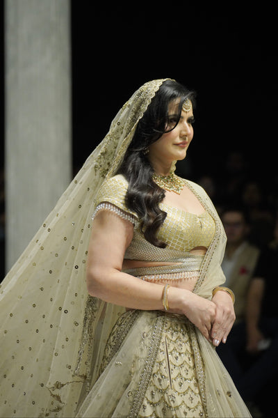 TOOSH DUPION EMBROIDERED TREE OF LIFE LEHENGA PAIRED WITH AN EMBROIDERED BLOUSE, TULLE NET EMBROIDERED DUPATTA, AND SILK ANTIQUE DUPATTA.(4PCS)