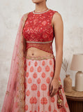 PINK LEHENGA SET FEATURING INTRICATE EMBROIDERY, FLORAL MOTIFS, AND A DELICATELY EMBELLISHED DUPATTA.