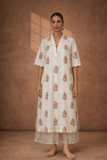 IVORY SILK CHANDERI TUNIC WITH DELICATE FLORAL BUTA AND SCALLOPED NECKLINE DETAILS