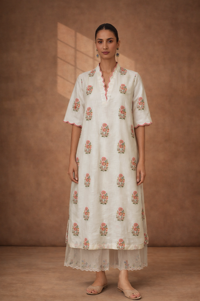 IVORY SILK CHANDERI TUNIC WITH DELICATE FLORAL BUTA AND SCALLOPED NECKLINE DETAILS