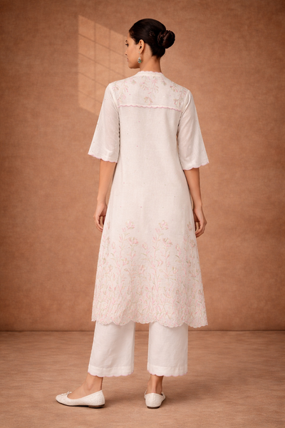 IVORY CHANDERI KURTA WITH PINK FLORAL EMBROIDERY AND SCALLOPED EDGES