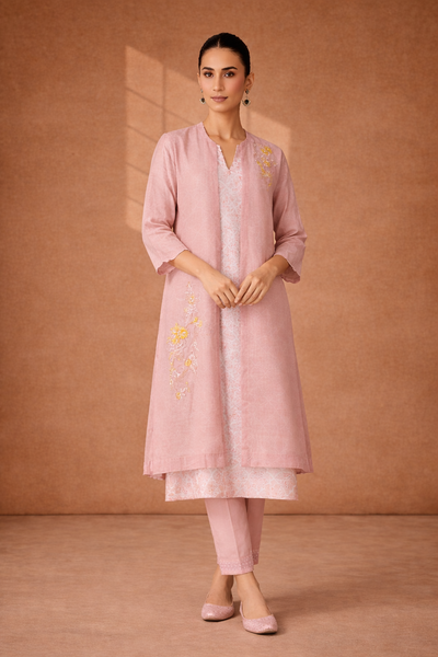 A SOFT ONION PINK KOTA KURTA SER WITH DELICATE HAND EMBROIDERY FOR AN EASY , ELAGANT LOOK