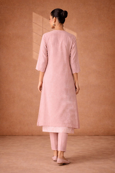 A SOFT ONION PINK KOTA KURTA SER WITH DELICATE HAND EMBROIDERY FOR AN EASY , ELAGANT LOOK