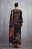 A BLACK EMBROIDERED DUPION SILK JACKET PAIRED WITH A PRINTED TUSSAR SILK SAREE