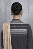 A BLACK HANDLOOM COTTON JACKET WITH MINIMAL WOVEN DETAILS.