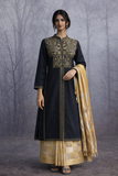 BLACK EMBROIDERED LINEN JACKET PAIRED WITH A GOLDEN-YELLOW SILK TISSUE SAREE