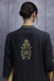 BLACK EMBROIDERED LINEN JACKET PAIRED WITH A GOLDEN-YELLOW SILK TISSUE SAREE