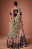 A BLUSH PINK LEHENGA PAIRED WITH A DEEP WINE EMBROIDERED BLOUSE (TL-103)