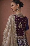 A ROYAL BLUE LEHENGA PAIRED WITH A DEEP WINE EMBROIDERED BLOUSE AND A SOFT GOLD DUPATTA.(TL-013)