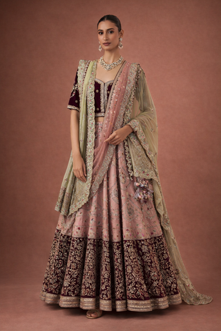 A BLUSH PINK LEHENGA PAIRED WITH A DEEP WINE EMBROIDERED BLOUSE (TL-103)