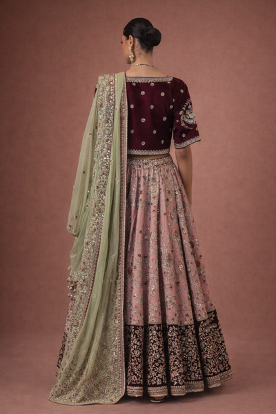 A BLUSH PINK LEHENGA PAIRED WITH A DEEP WINE EMBROIDERED BLOUSE (TL-103)