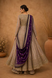 TAUPE ANARKALI SET FEATURING INTRICATE EMBROIDERY AND A RICH PURPLE EMBELLISHED DUPATTA
