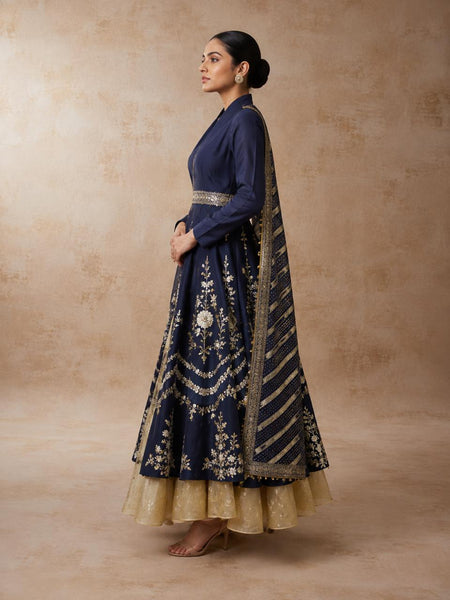A NAVY BLUE EMBROIDERED JACKET SET WITH A CONTRAST GOLD ANARKALI AND A WOVEN DUPATTA.(5PCS)