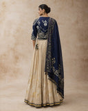 A NAVY BLUE EMBROIDERED BLOUSE PAIRED WITH A CONTRAST GOLD SKIRT AND A MATCHING DUPATTA.(3PCS)
