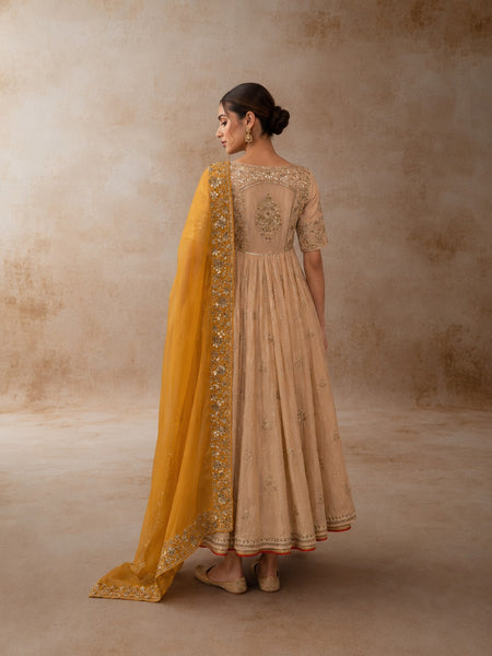 A TOOSH ANARKALI PAIRED WITH A MUSTARD DUPATTA. (3PCS)