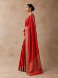 A BRIGHT RED SAREE WITH GEOMETRIC PATTERNS AND A DETAILED GOLD BORDER.(2PCS)